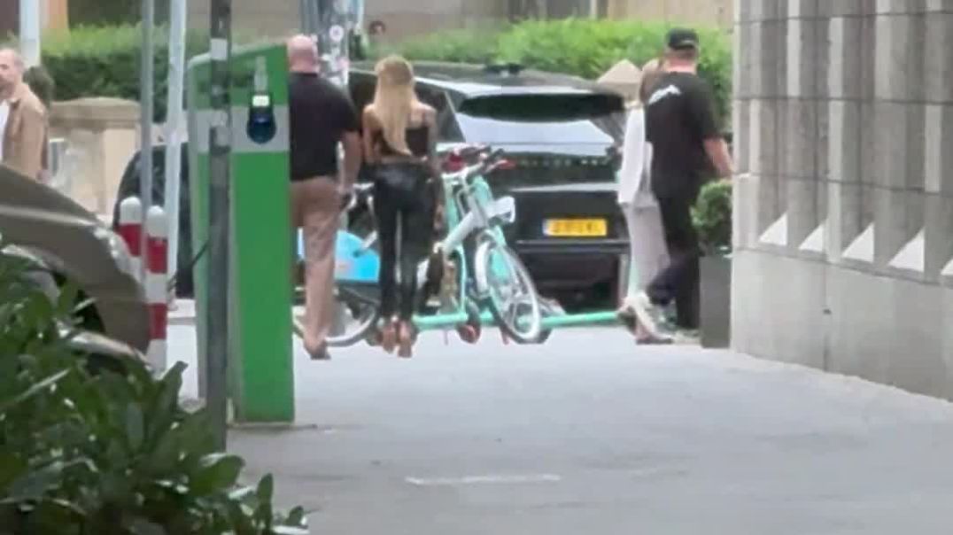 Beauty with leather pants and nude heels