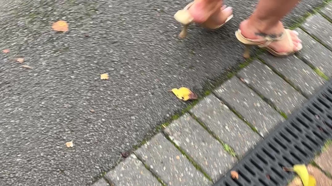 wifes feet in strappy heels popping