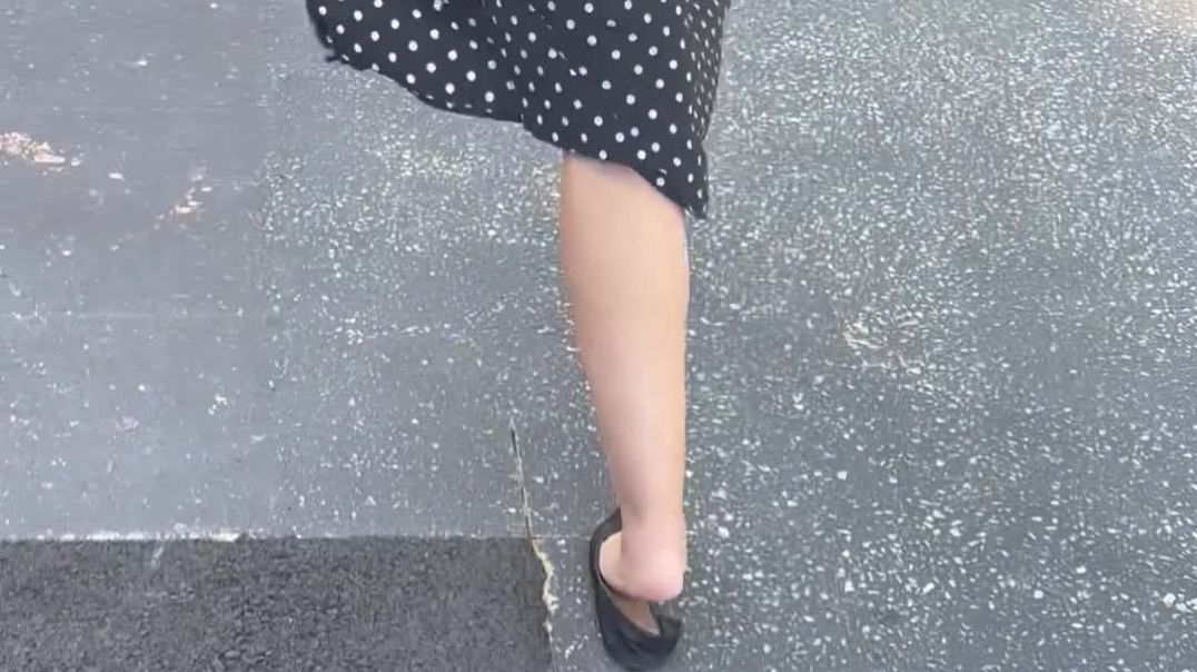 Still wearing her squashed D’orsay flats