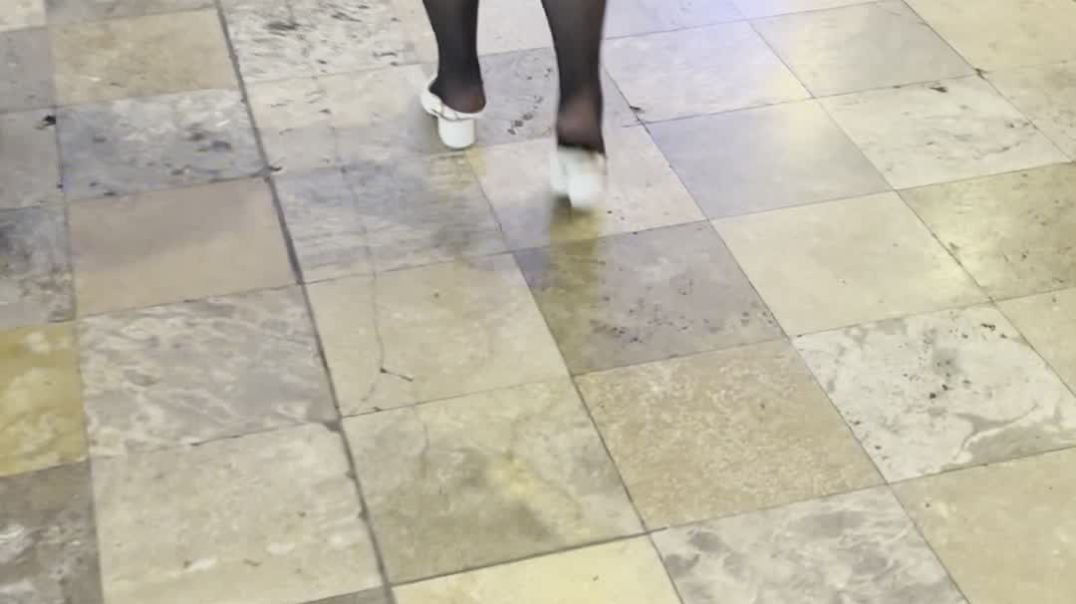 Lady walking in crushed slingbacks heels