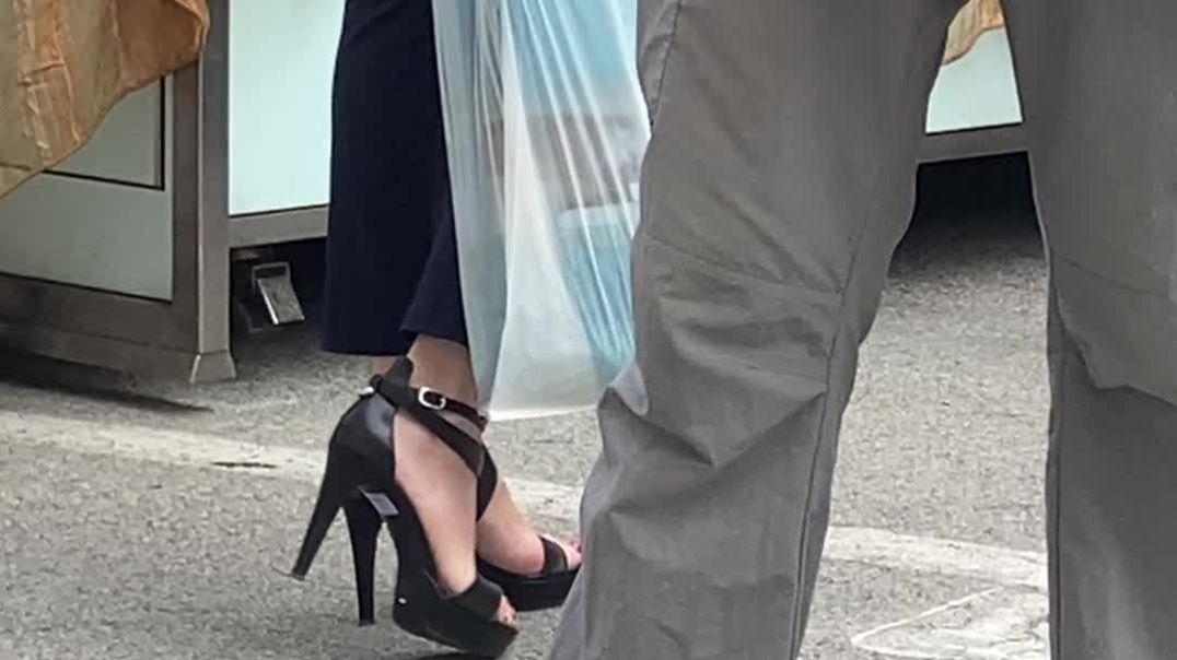 Lady in strappy pumps