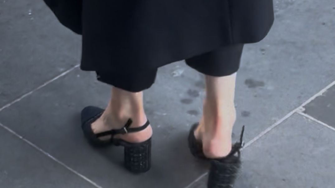 Losing her backstrap walking to work