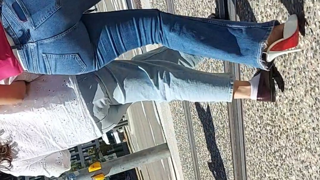 Big booty in tight jeans and beautiful heels