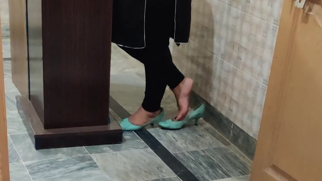candid dipping behind a desk