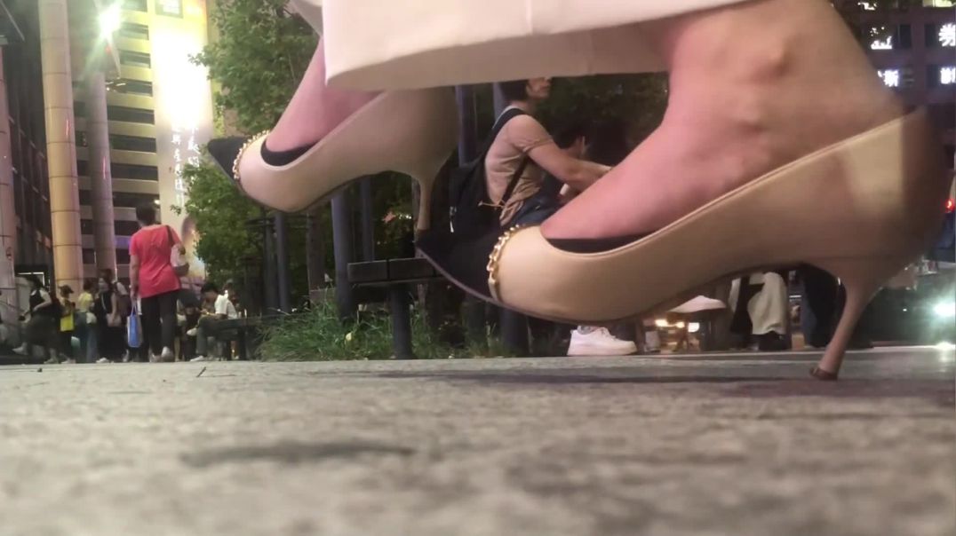 candid shoeplay in a park