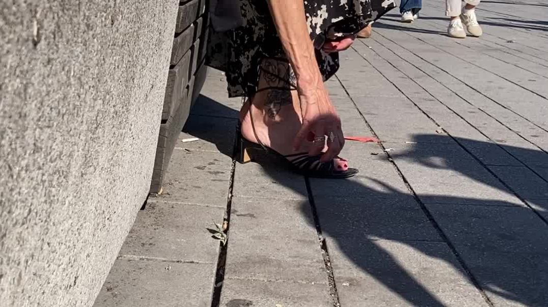 Adjusting her shoes