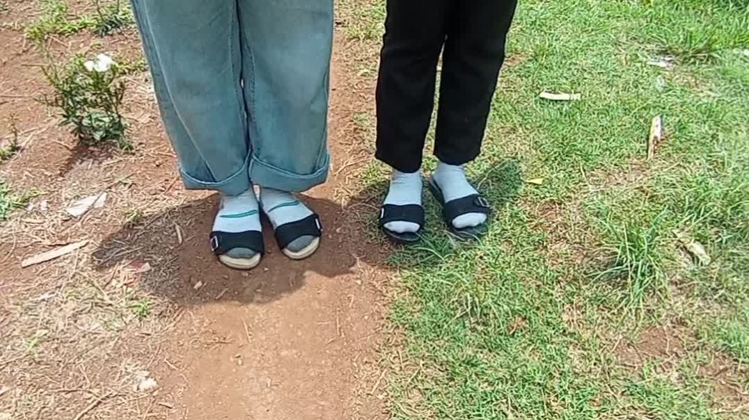 Indonesion girls gtrying out wooden sandals